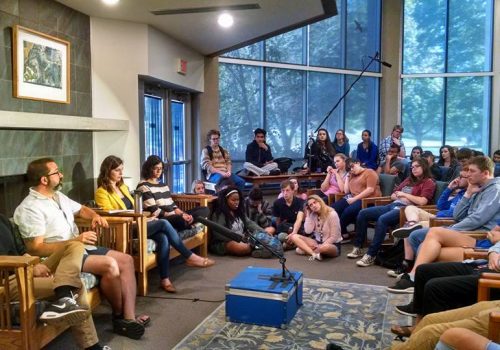 Faculty and students gather in the Laurel Forum to hear the Writing in the Disciplines panel.